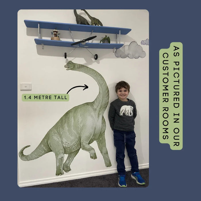 Brachiosaurus wall decal at 1.4 metres tall shown beside a child