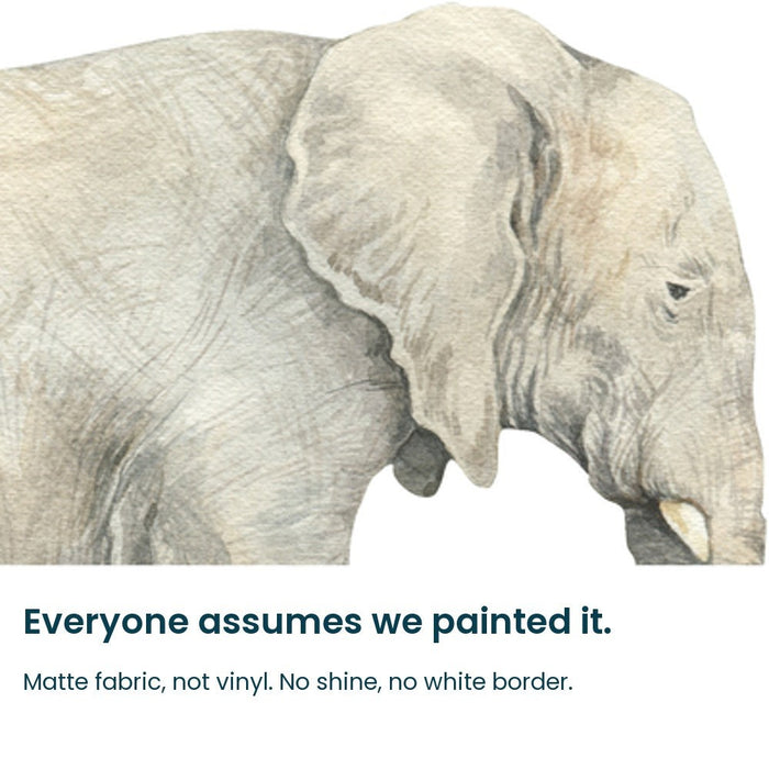 Close-up of the hand-painted watercolour elephant face on matte fabric