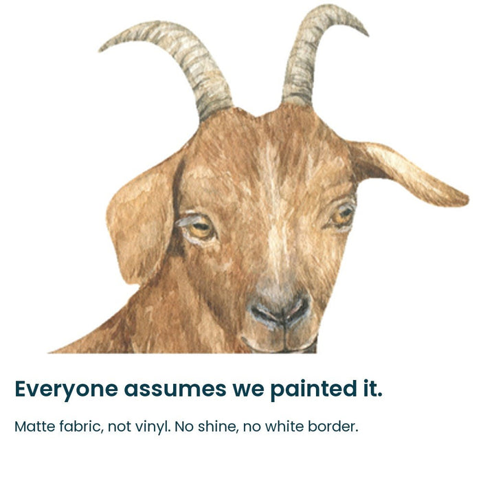 Close-up of the hand-painted goat face on matte fabric