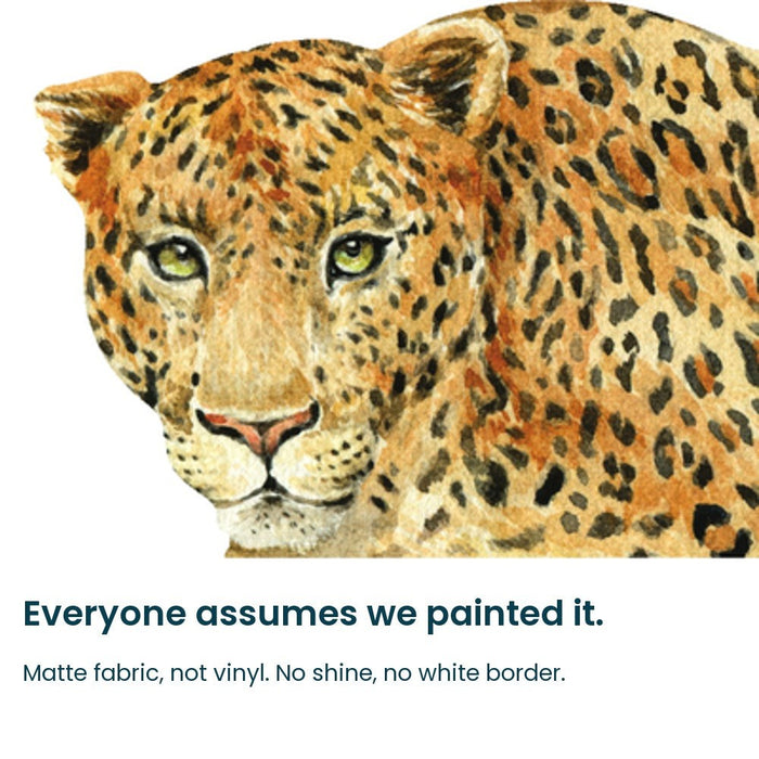 Close-up of the hand-painted leopard face on matte fabric