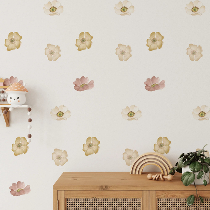 Marigold mini floral decals in cream and blush above a cane sideboard