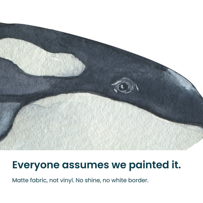 Close-up of the watercolour whale decal