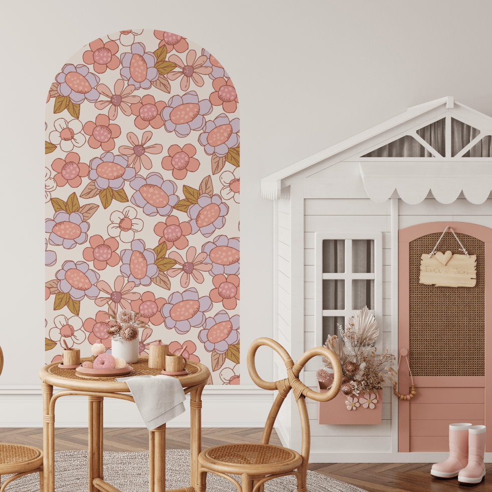 Remi floral arch decal in pink and rust beside a cubby house