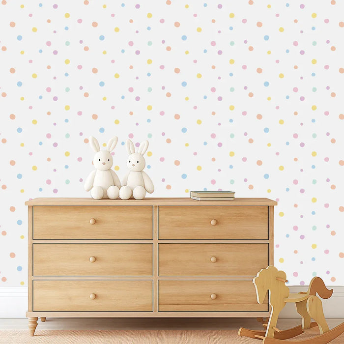 Danish Pastels spot decals scattered above a timber dresser in a nursery