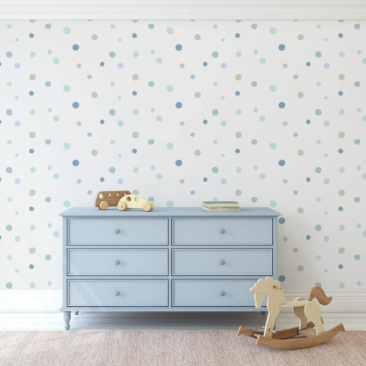 Cool and Calm Blue spot decals scattered above a pale blue dresser