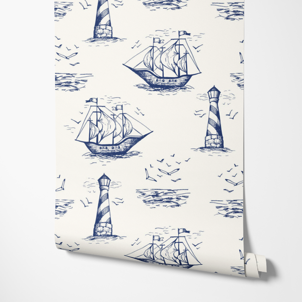 Jack Blue Nautical Sailship wallpaper unrolled, showing navy ships and lighthouses on cream