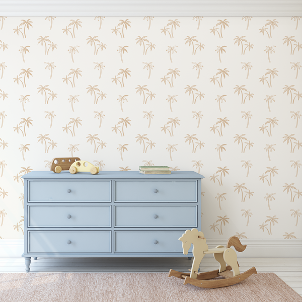 Light blue dresser against a wall with palm tree pattern