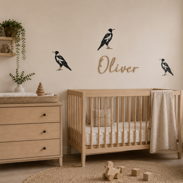 Nursery room with wooden crib, dresser, and decorative wall art.