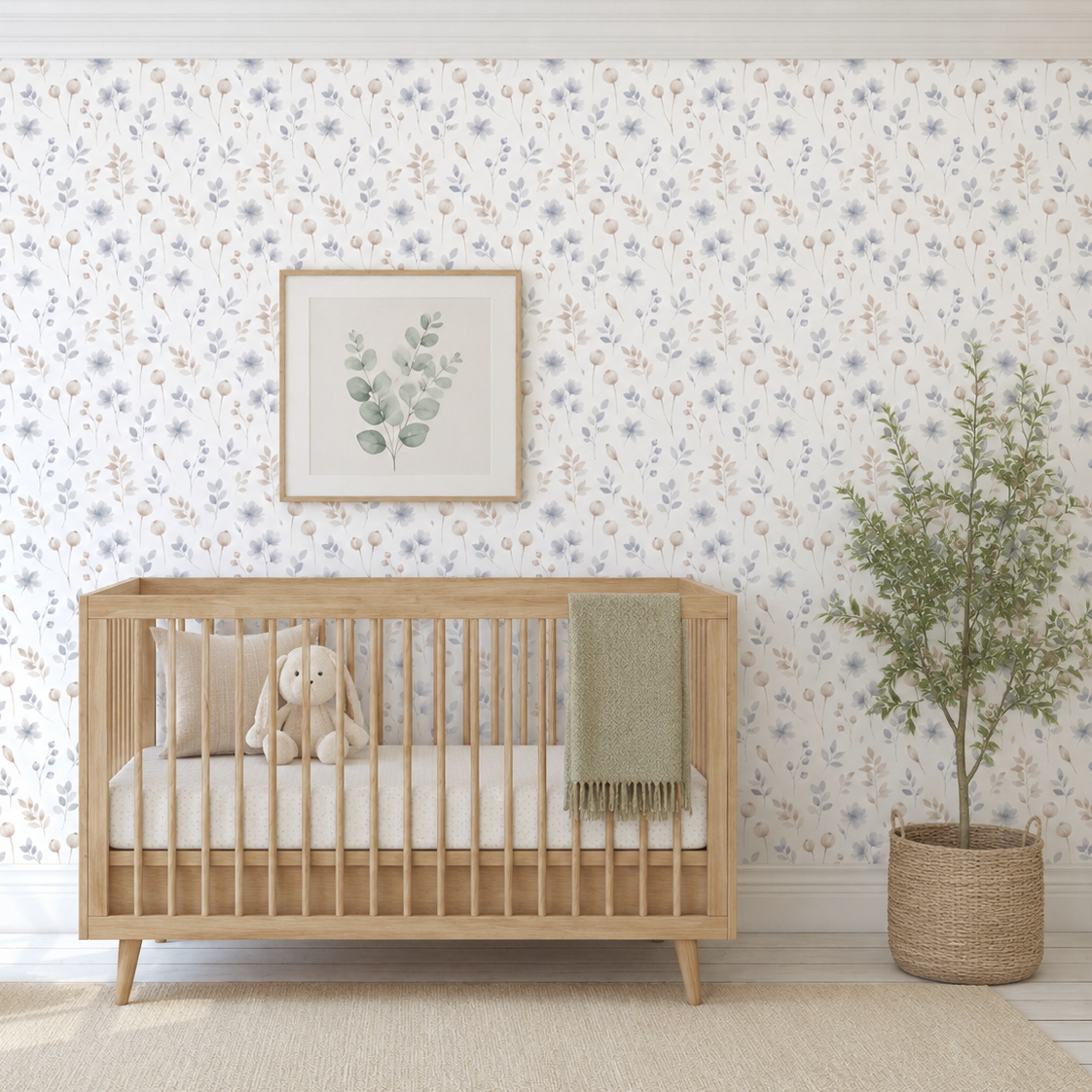 Nursery room with wooden crib, floral wallpaper, and decorative elements.