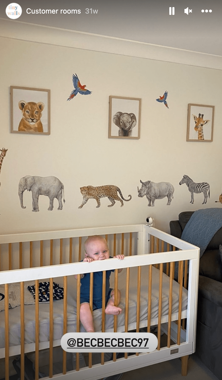 Customer photo of safari animal wall decals in a nursery