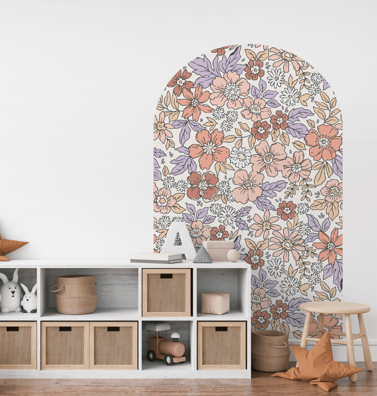 Harmony Belle floral arch decal in coral and lilac above storage cubes