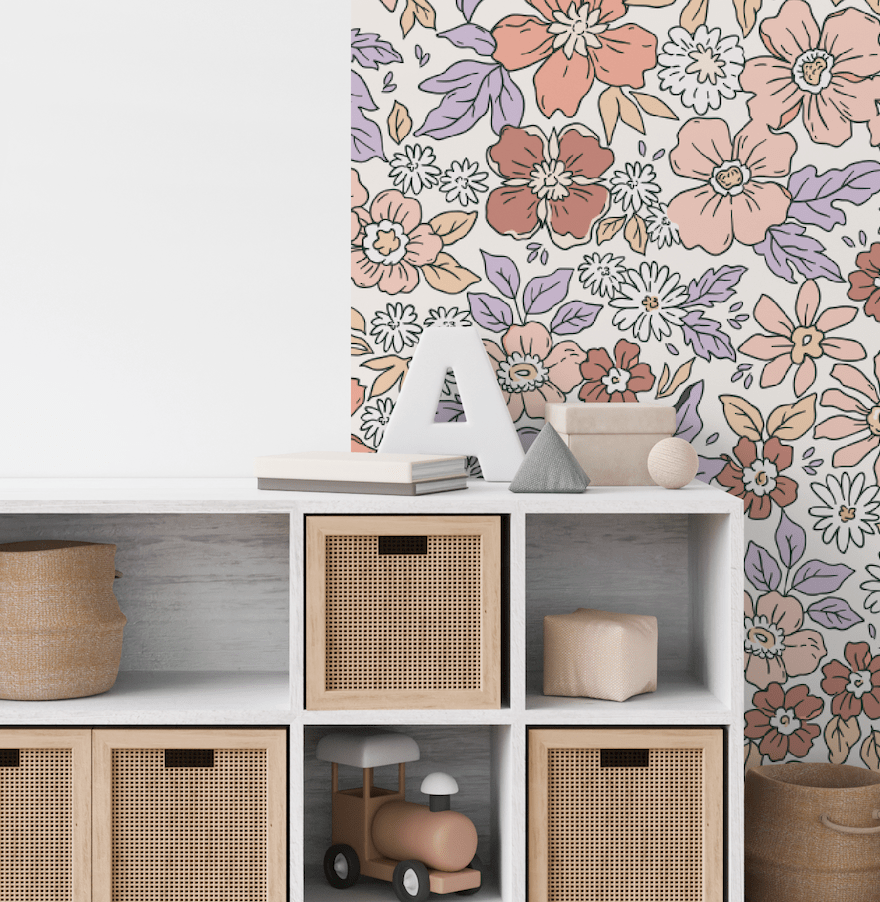 Harmony Belle floral arch decal behind white storage cubes in a playroom