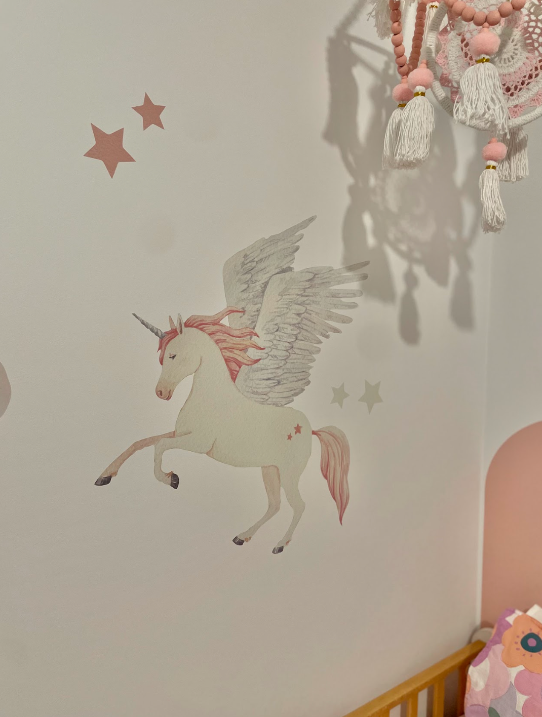 Customer photo of a flying unicorn decal with star decals