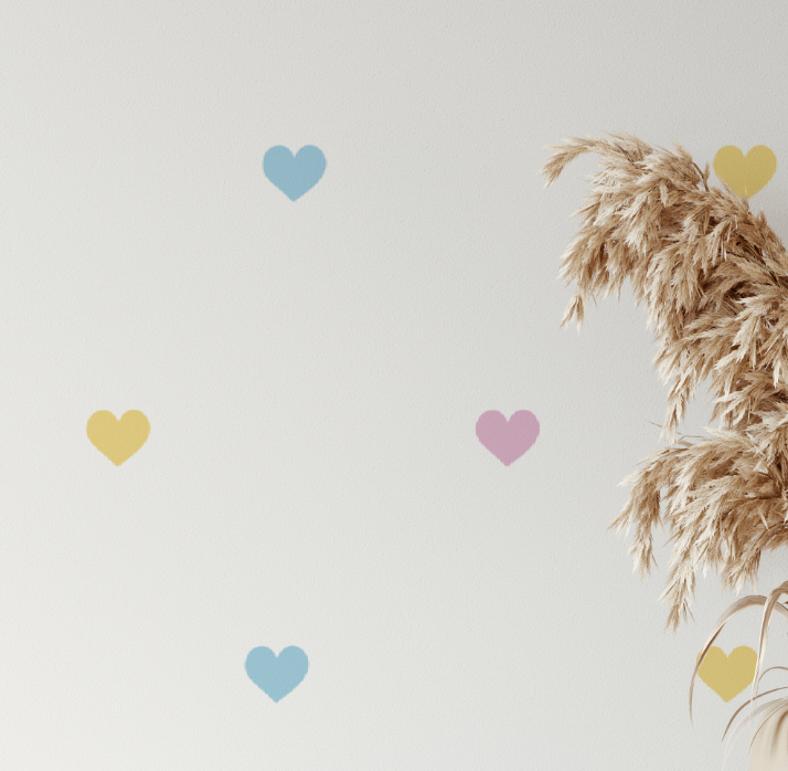 Close-up of Danish Pastels mini heart decals in blue, yellow and pink
