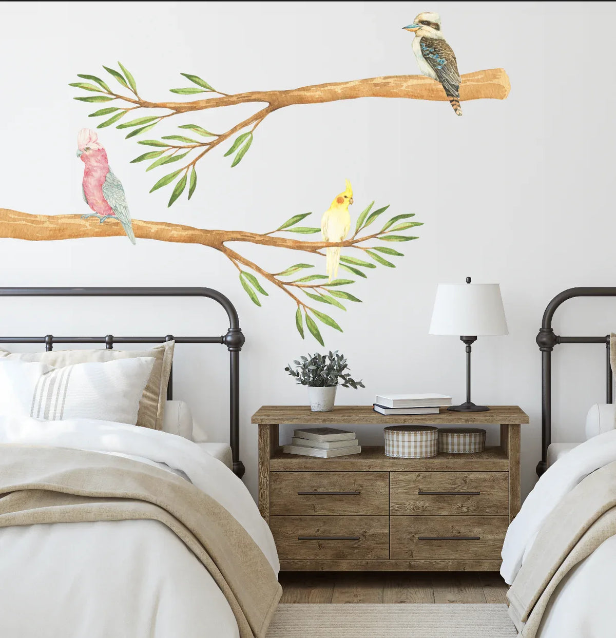 Gum tree branch decal with a galah, cockatiel and kookaburra above a bed