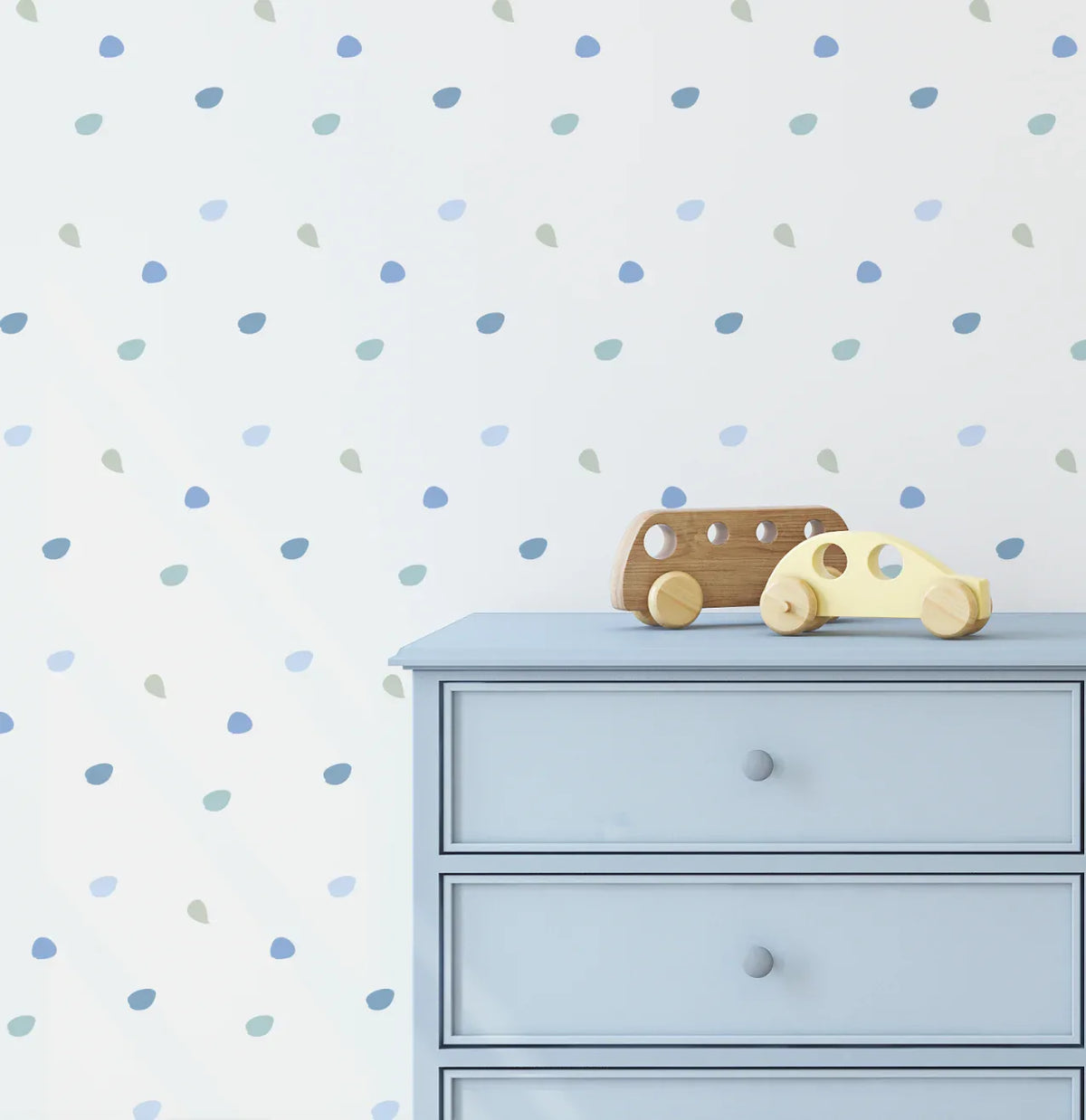 Happy Dots Cool and Calm blue decals scattered above a dresser with a toy car