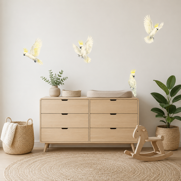Wooden dresser with decorative items in a room with plants and a rocking horse.