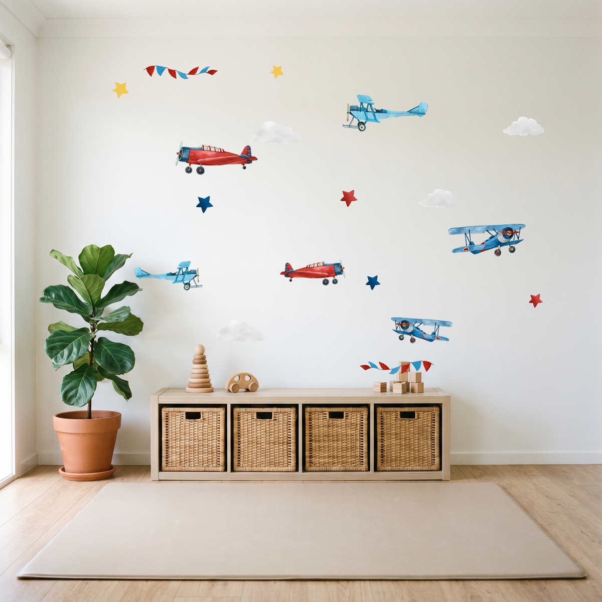 Children's room with airplane wall decals, wicker storage baskets, and a plant.