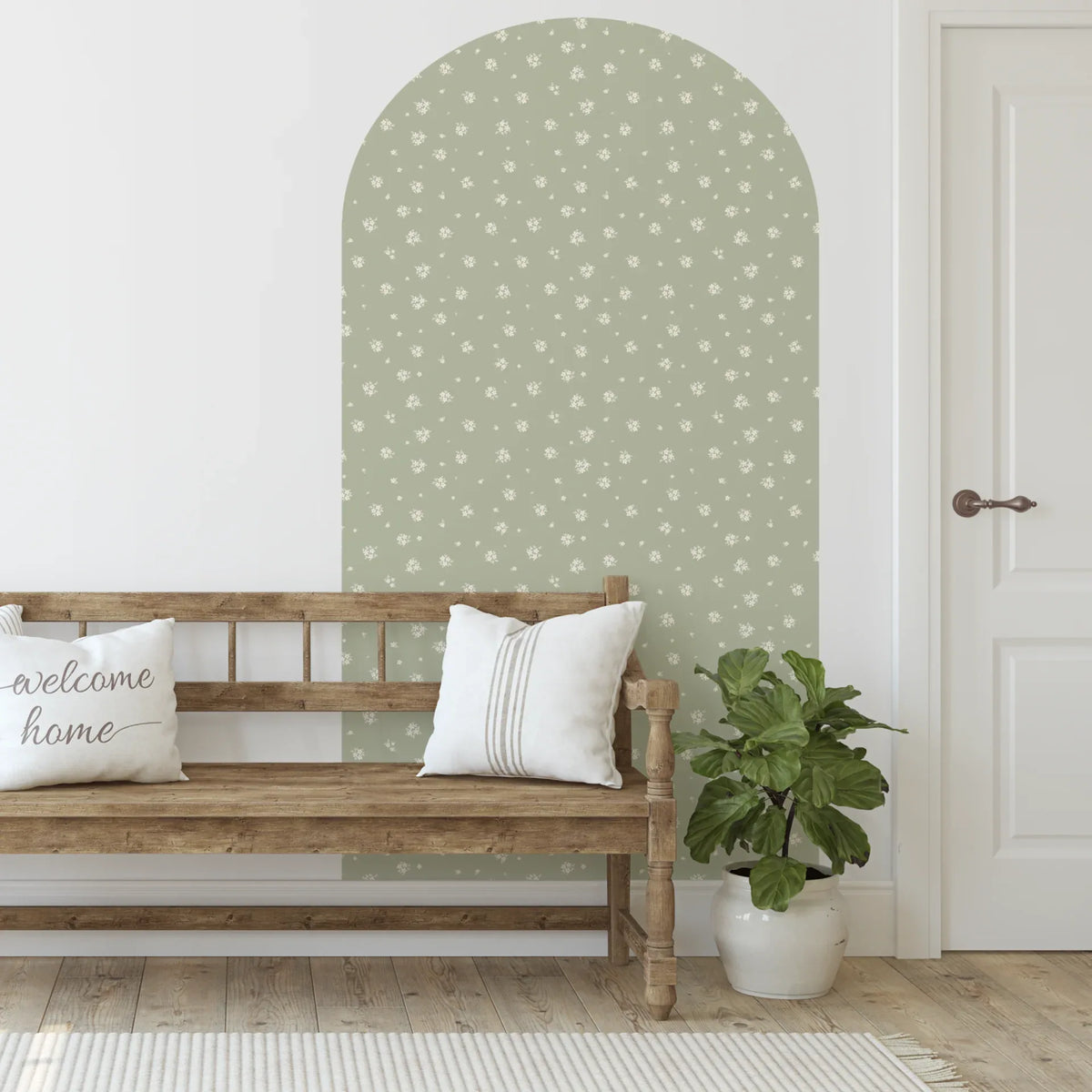 Alice Sage Green arch decal with white flowers above a timber bench