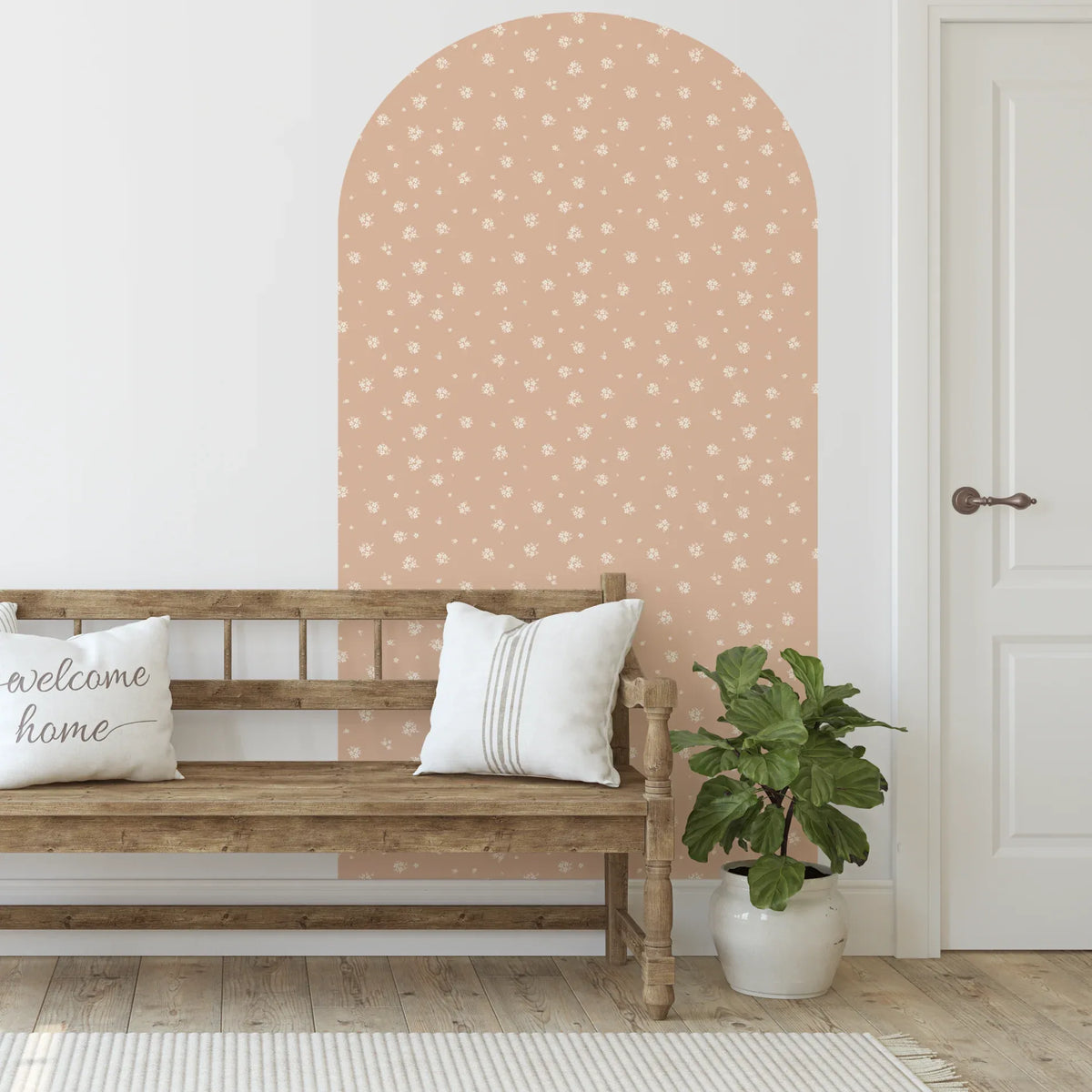 Alice Pink arch decal with white flowers above a timber bench