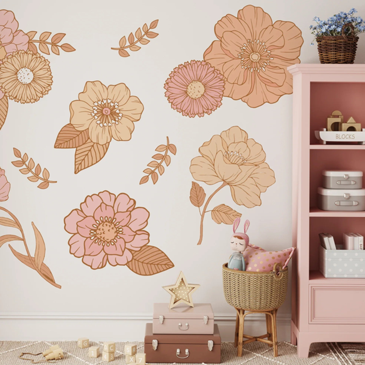 Allie boho floral decals with large peach blooms beside a pink bookshelf