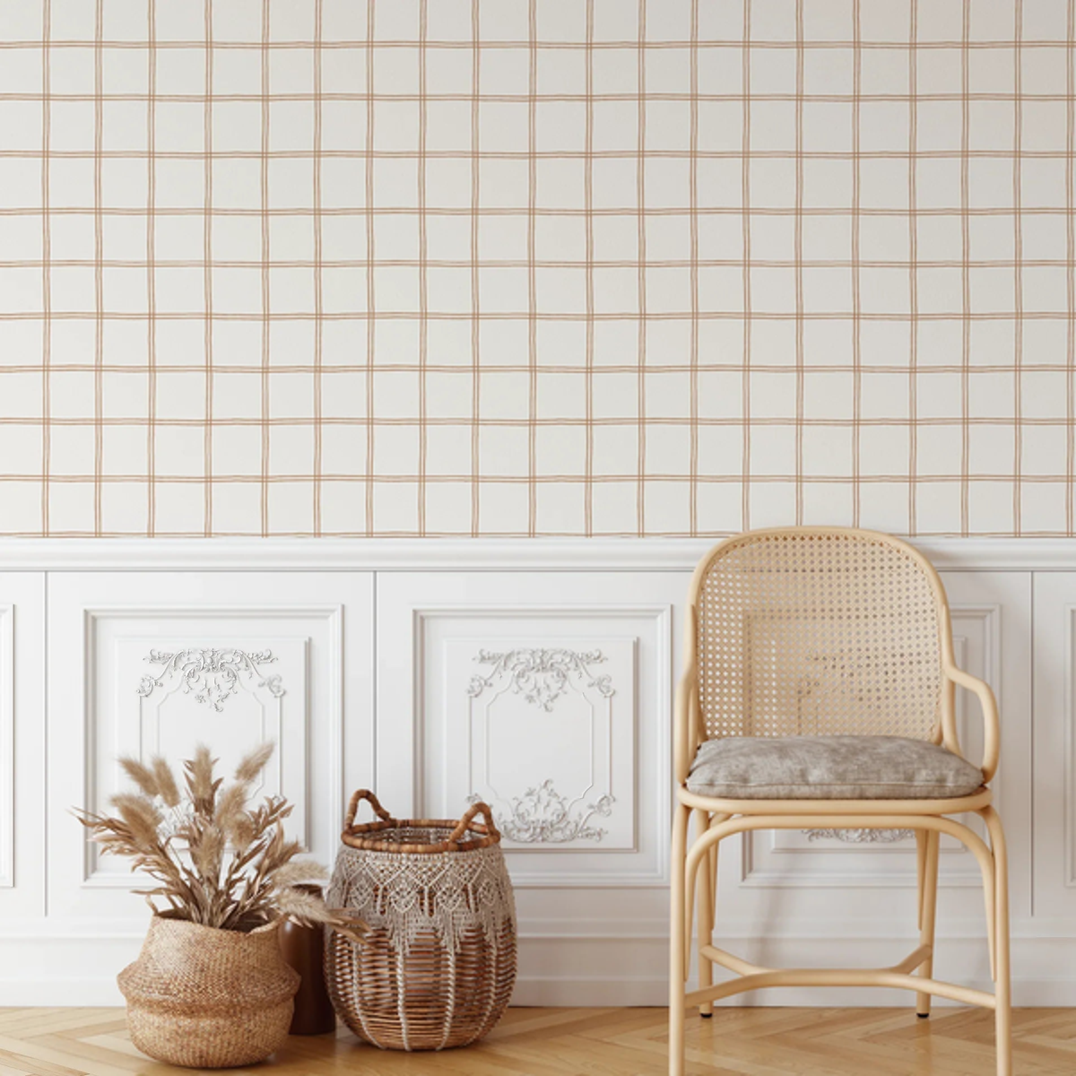 Austin Grid Rust wallpaper above wall panelling with a rattan chair and woven baskets