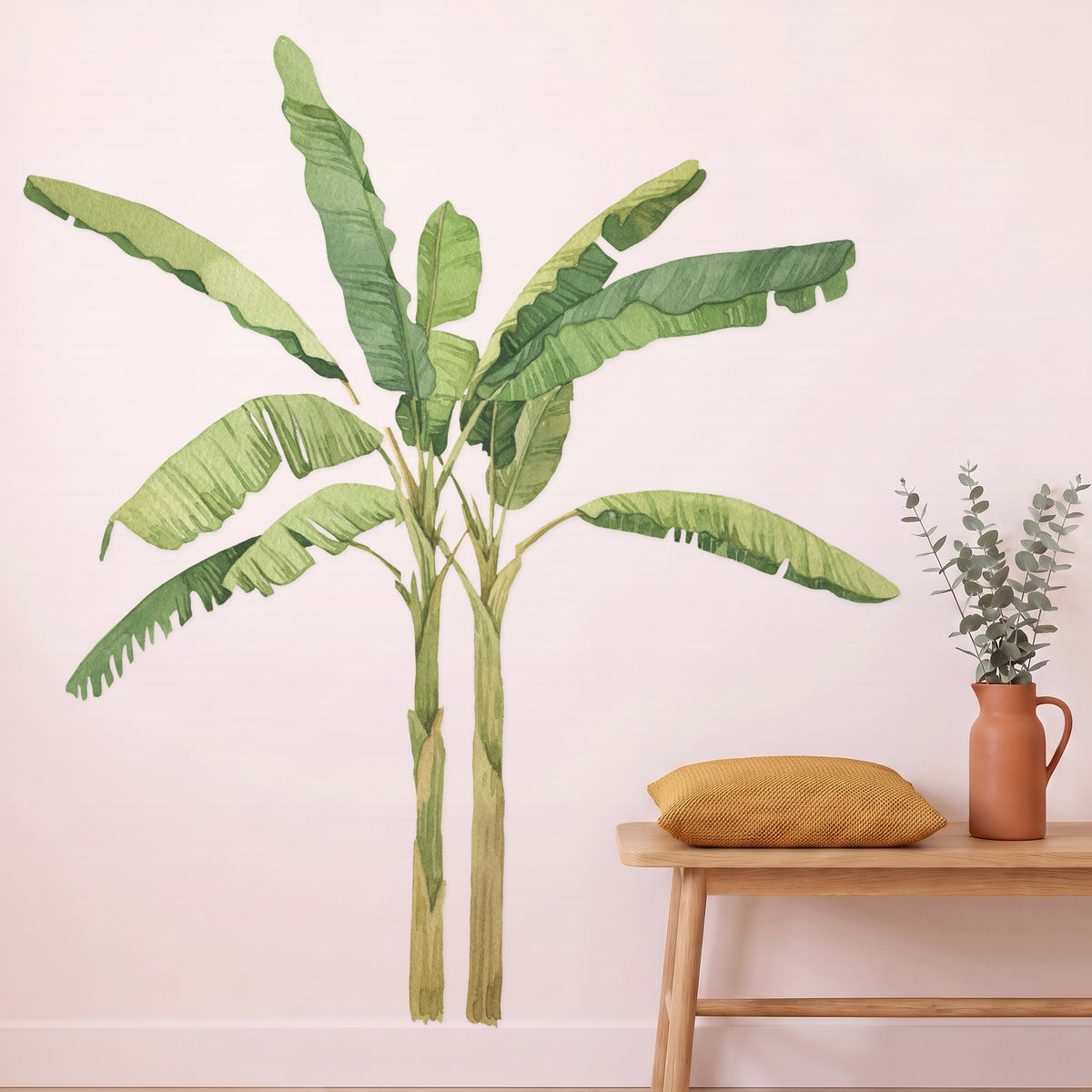 Banana palm tree wall decal on the skirting in a styled nursery