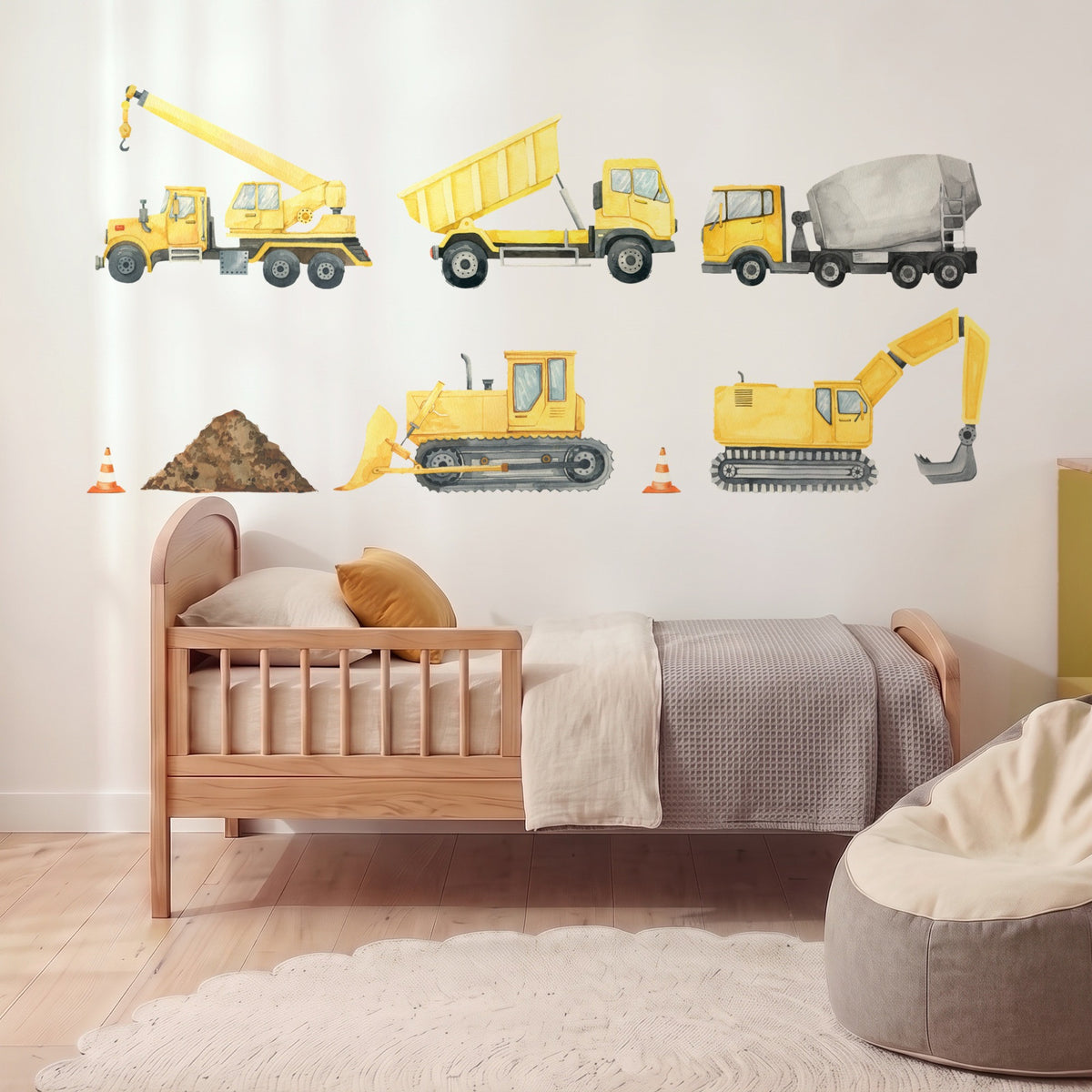Construction vehicle wall decals in a boy's bedroom