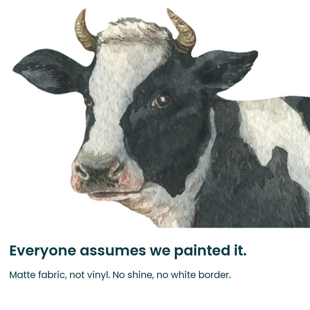 Close-up of the hand-painted cow face on matte fabric