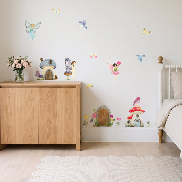 Flower fairy wall decals with a fairy village, fairies and butterflies on a girls' bedroom wall
