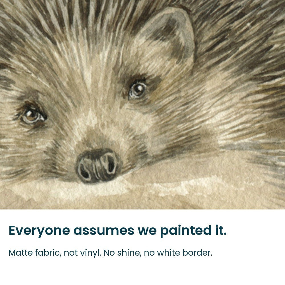Close-up of the hand-painted hedgehog face on matte fabric