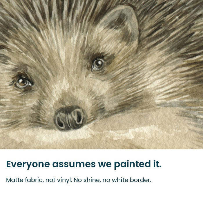 Close-up of the hand-painted hedgehog face on matte fabric