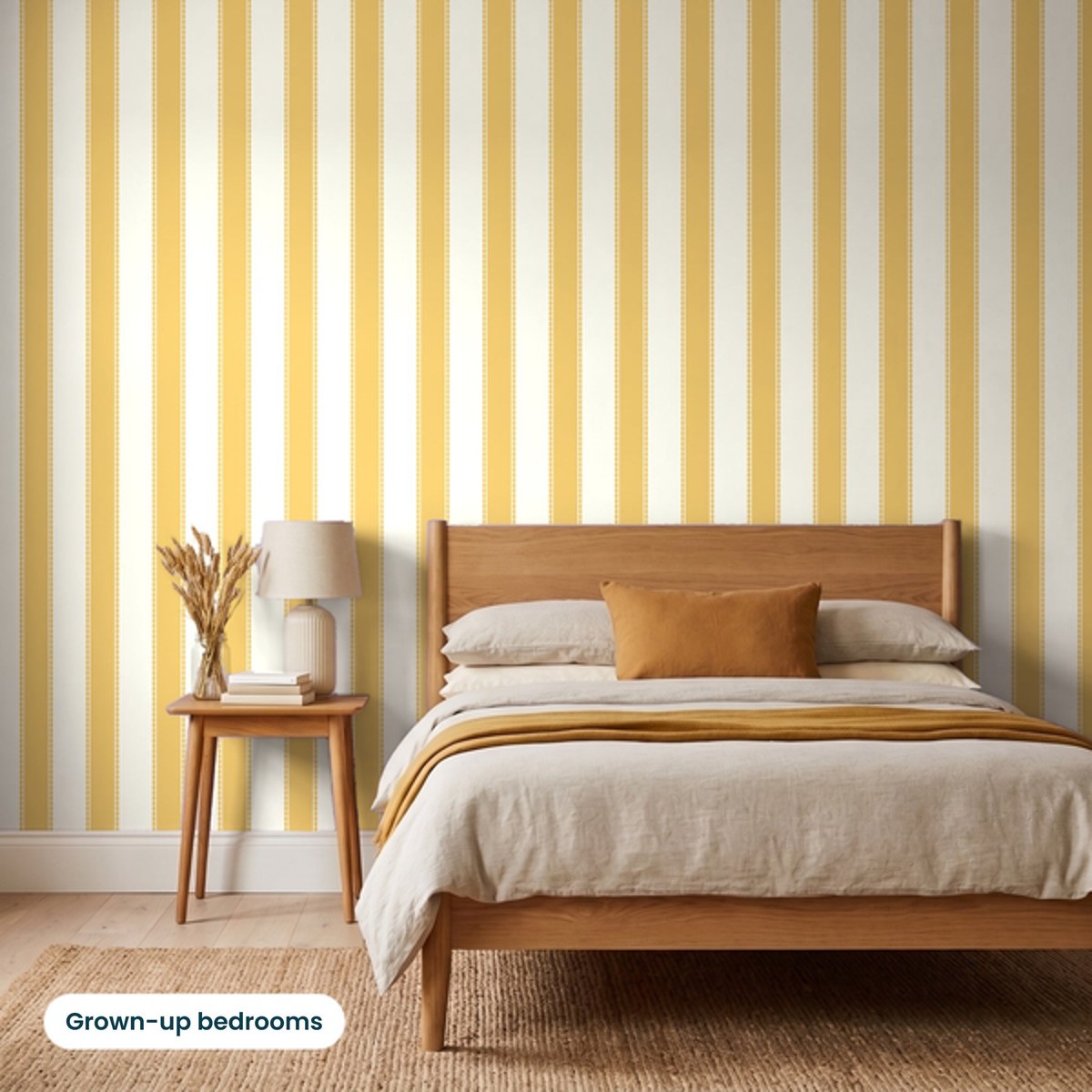 Henrietta Butterscotch Stripes wallpaper behind an oak queen bed in a grown-up bedroom