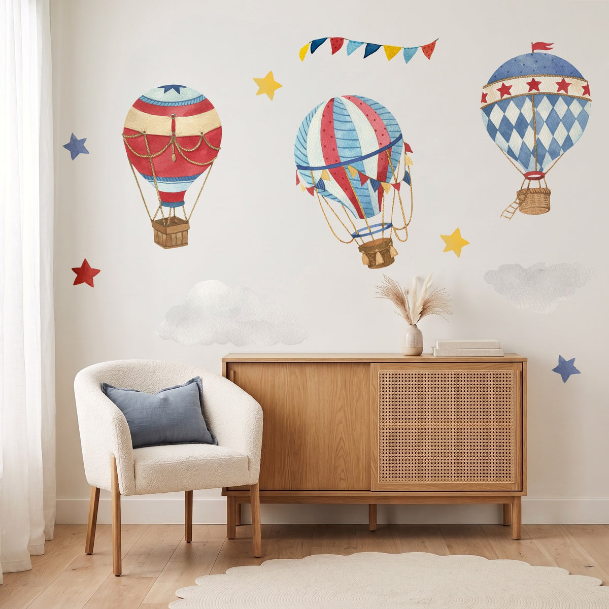 Hot air balloon wall decals with clouds and stars in a kids' reading corner