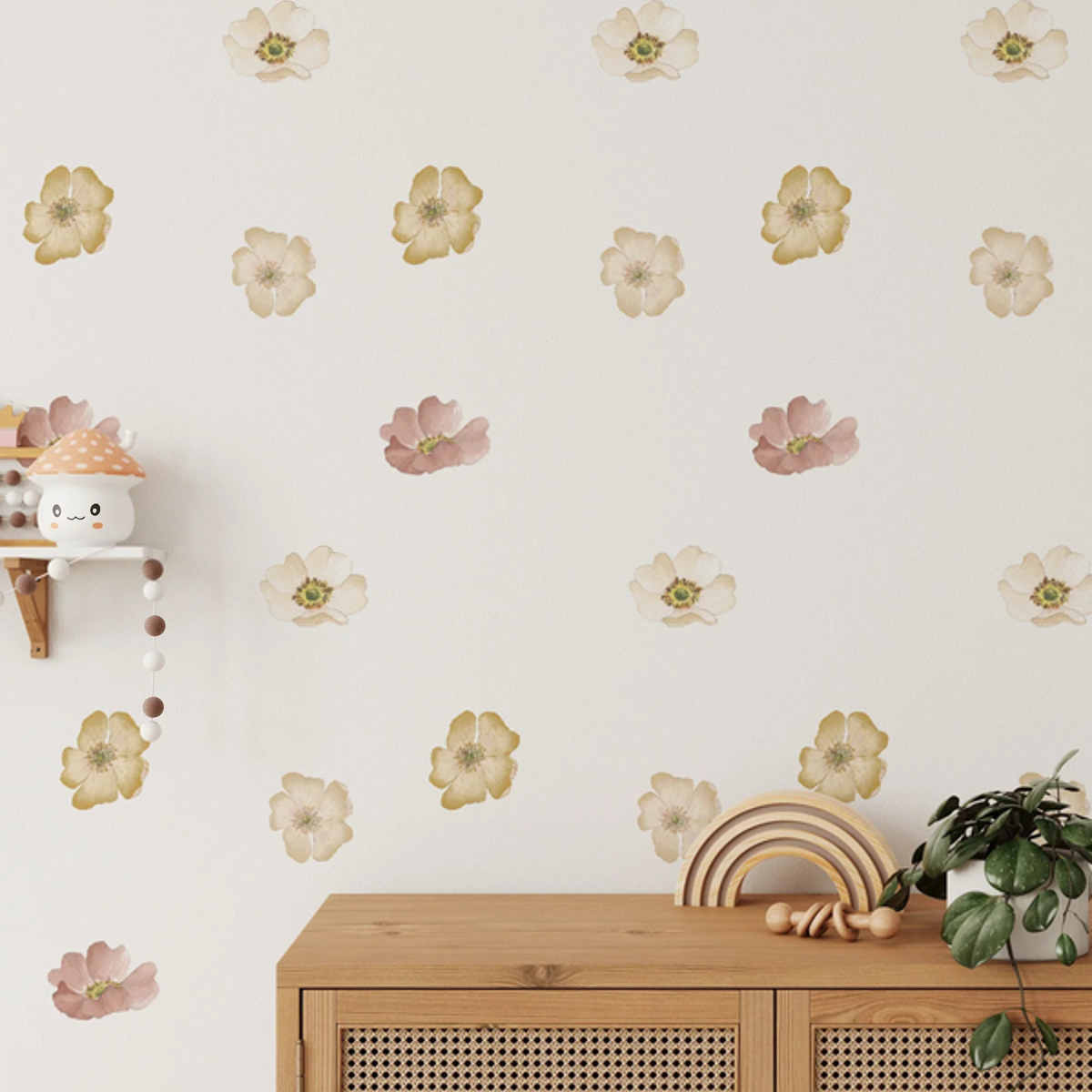 Marigold mini floral decals in cream and blush above a cane sideboard