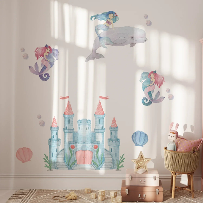 Mermaid and castle wall decals on a nursery wall with sea shells