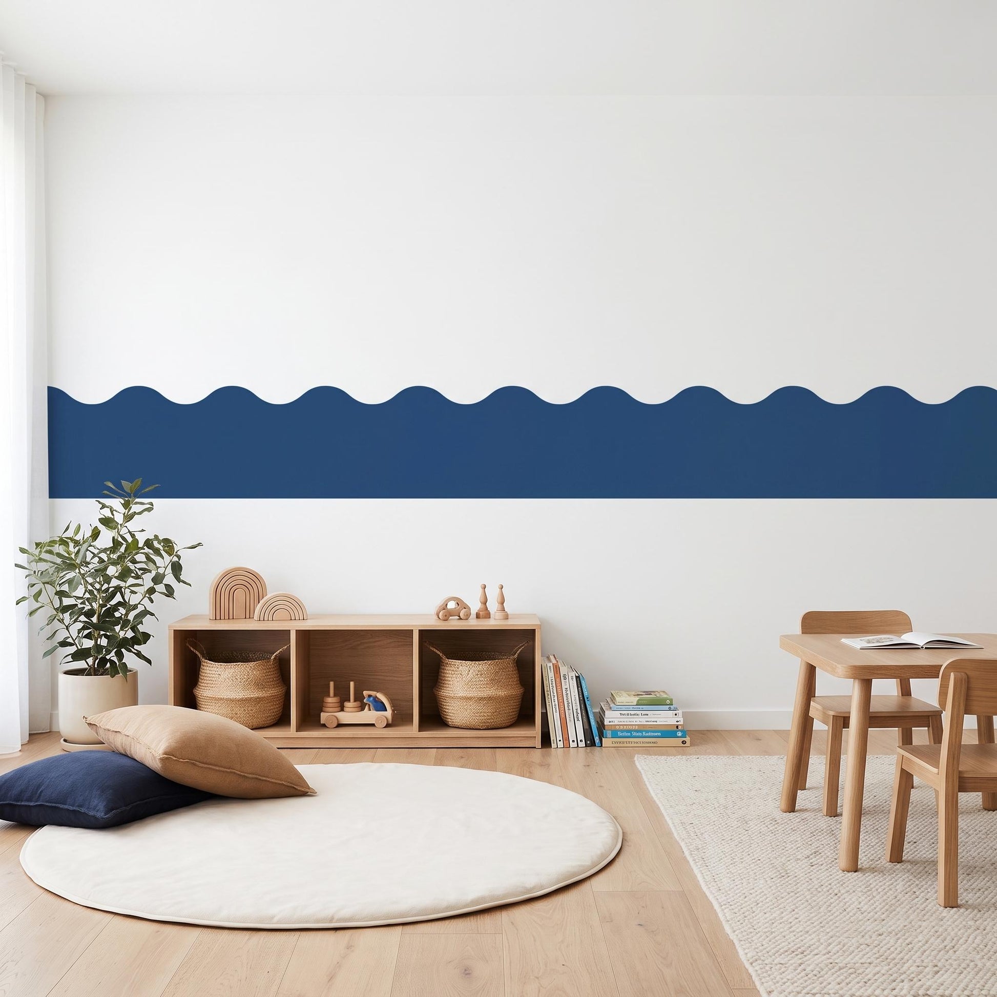 Modern room with wavy blue accent stripe on white wall, wooden furniture, and decor items.
