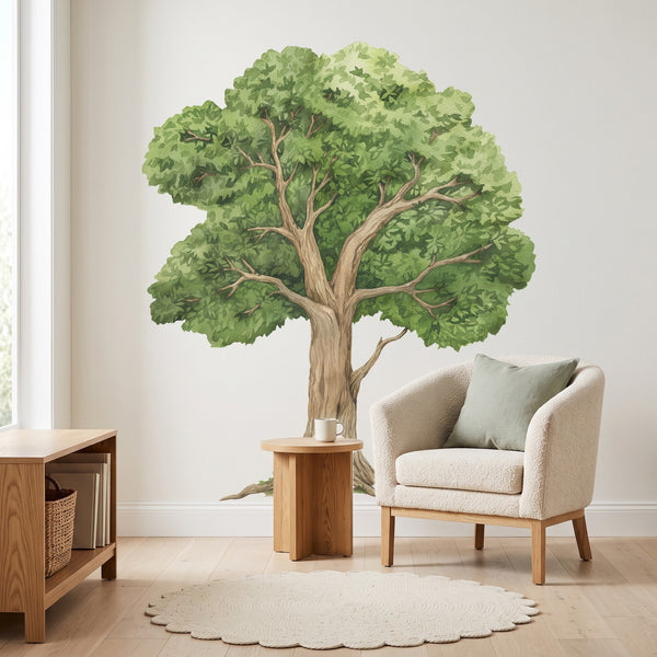 Large oak tree wall decal in a reading corner behind an armchair and side table