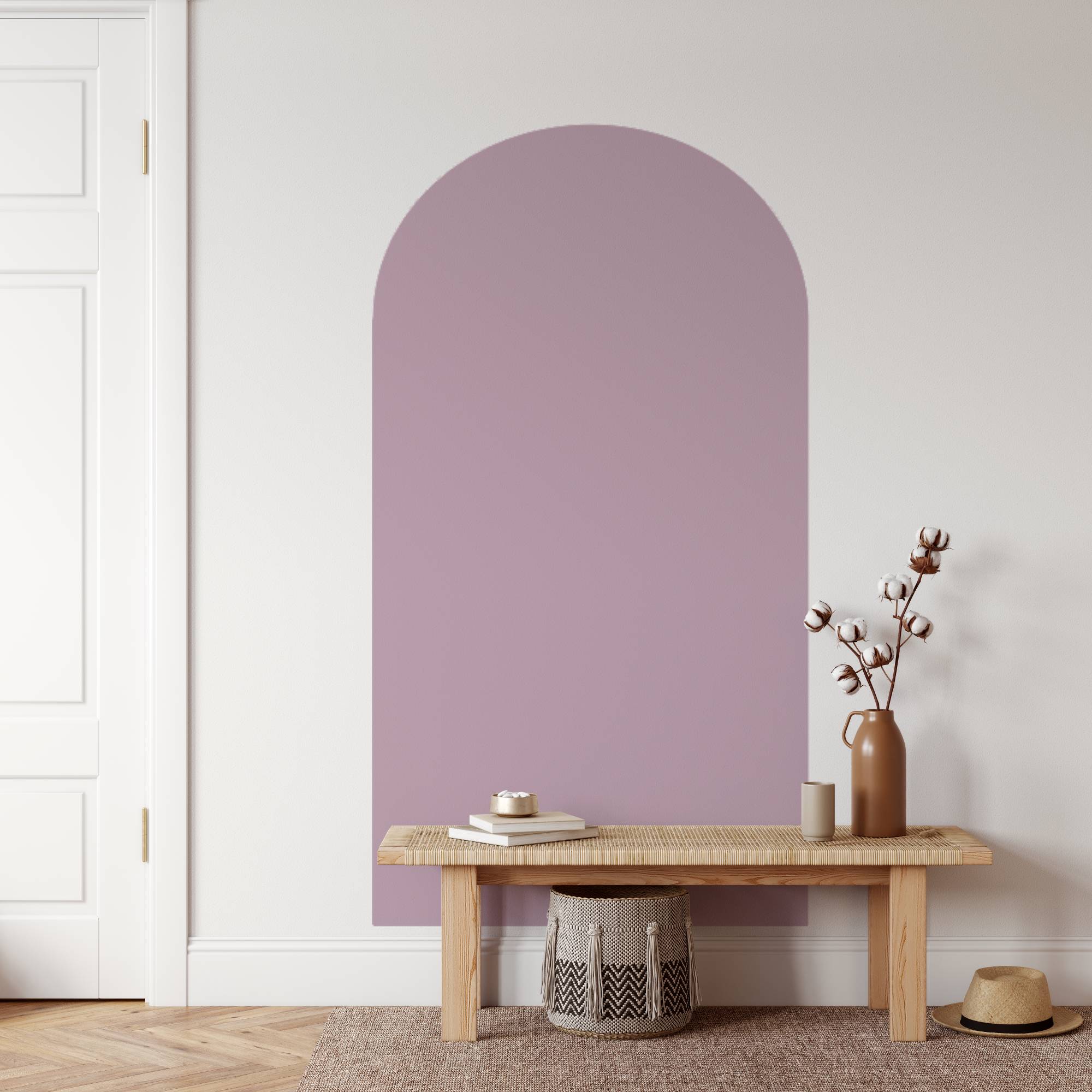 Wooden bench with decorative items against a light purple wall.