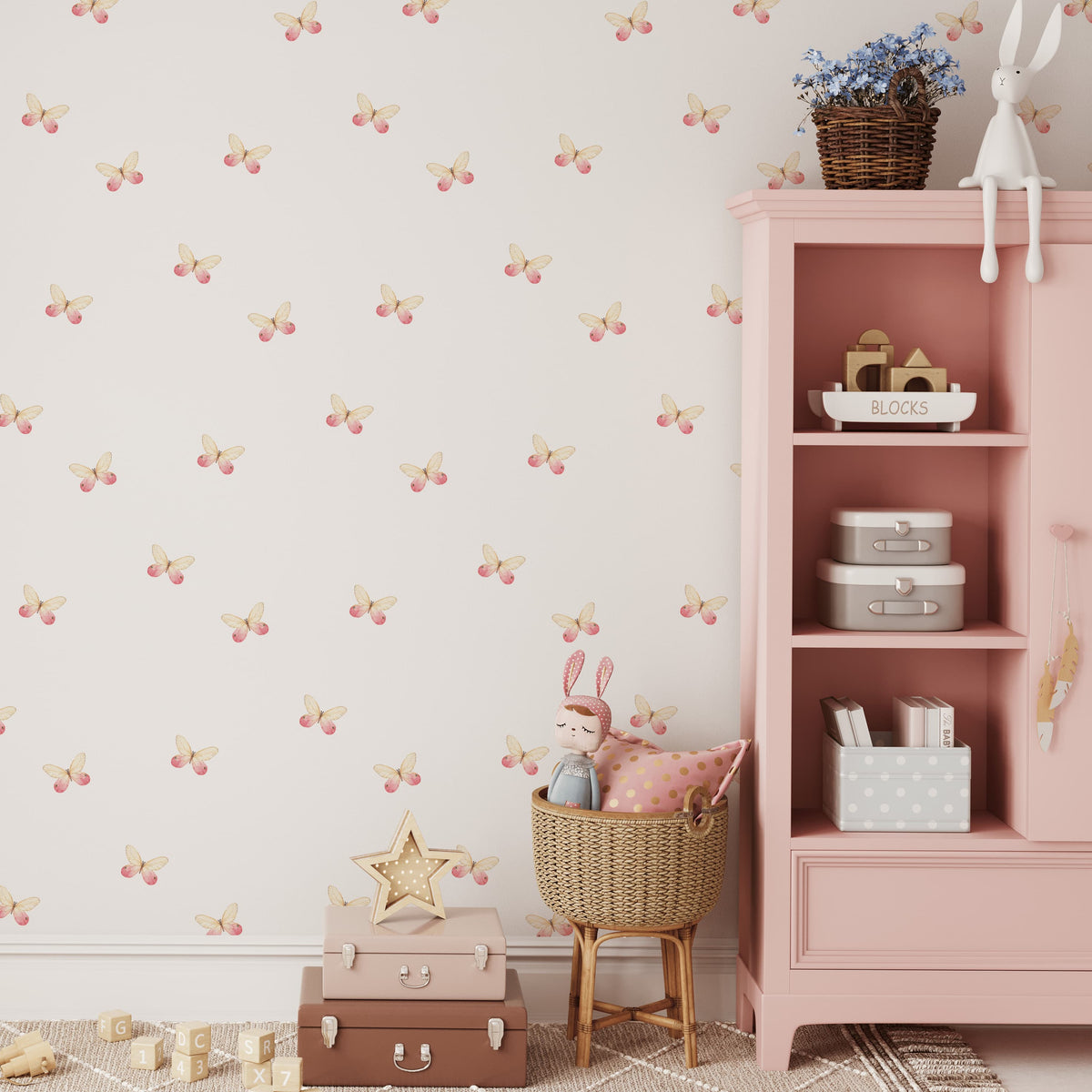 Pink butterfly wall decals scattered beside a pink bookshelf