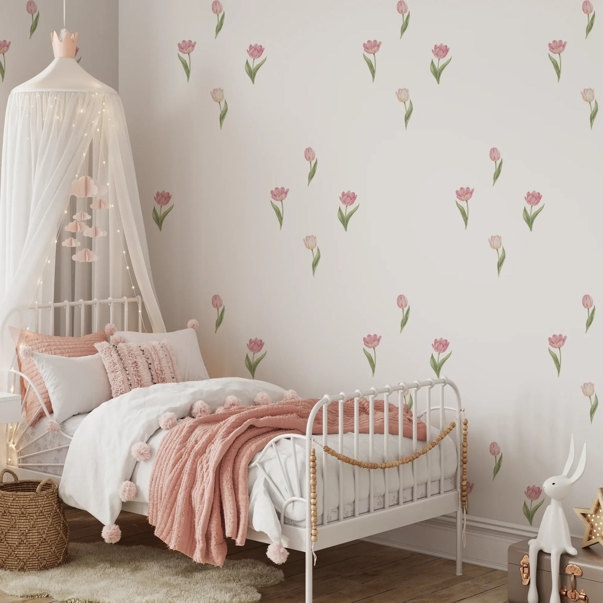 Pink tulip wall decals in a girls room with a white canopy