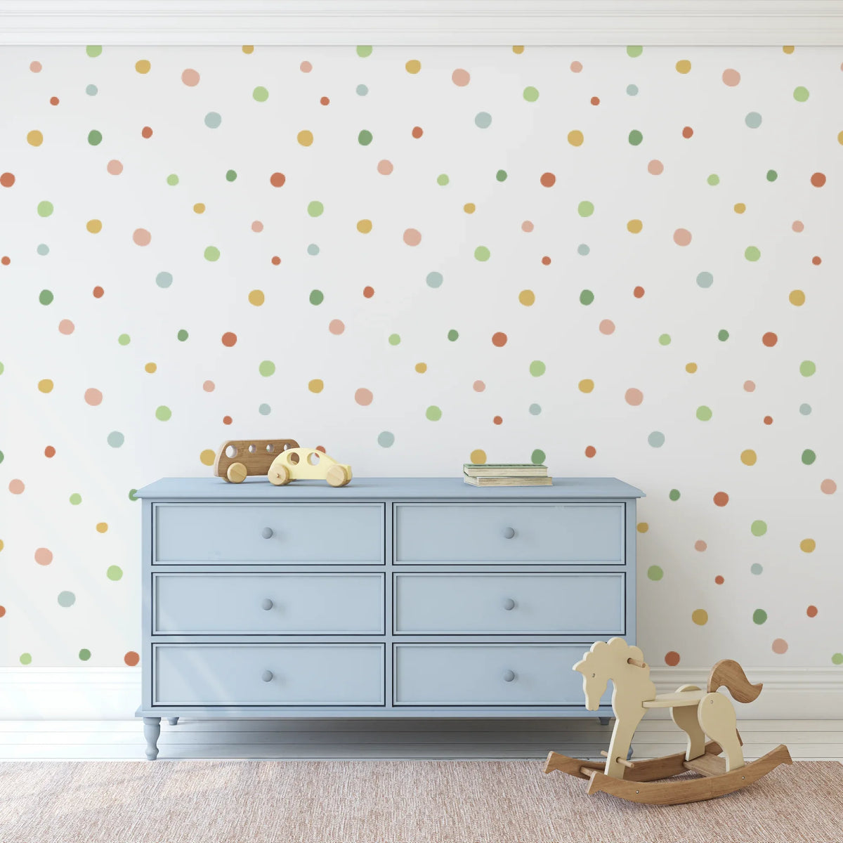 Sunset Glow spot decals in red, green and yellow above a pale blue dresser