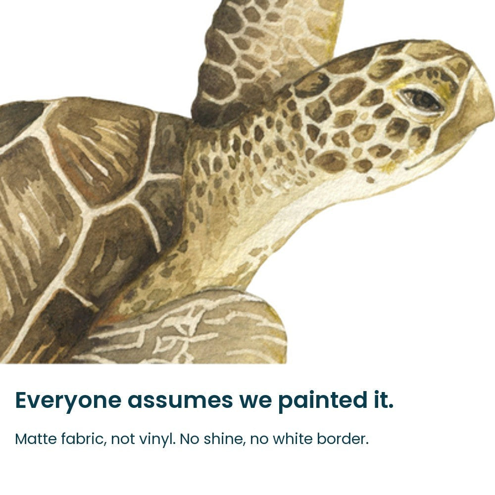 Close-up of the hand-painted sea turtle shell and head on matte fabric