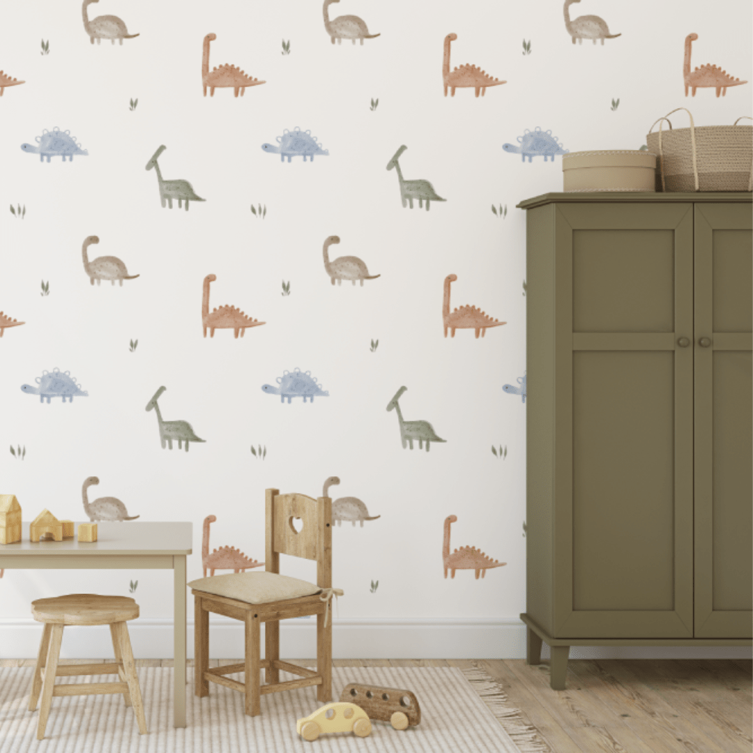 Archer Dinosaur wallpaper in a kids room with a green wardrobe and timber table