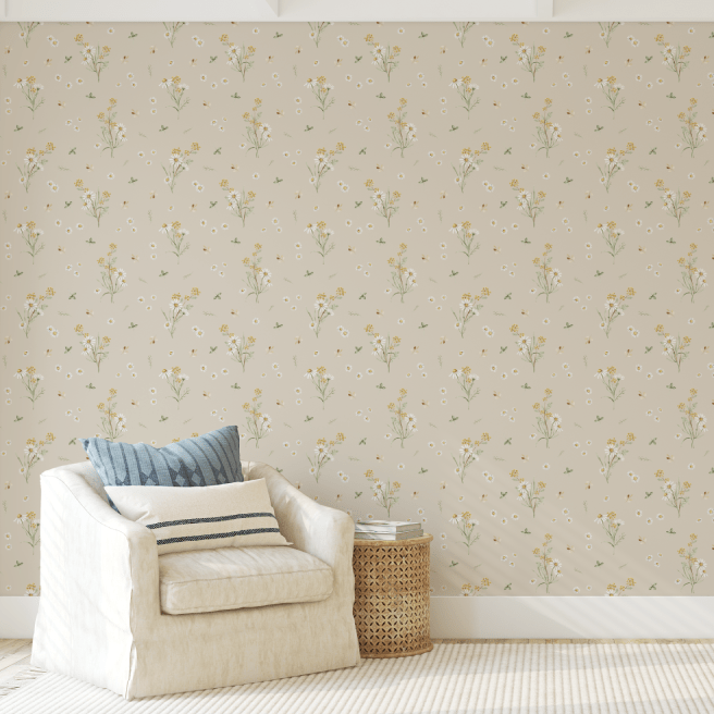 Meadow Daisy wallpaper on a greige ground behind a cream armchair