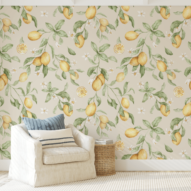 Sorrento Botanical Lemon wallpaper behind a cream armchair and woven basket