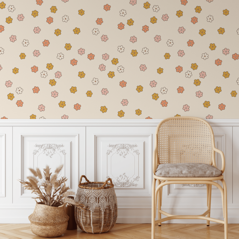Clementine Boho Daisy wallpaper above wall panelling with a rattan chair