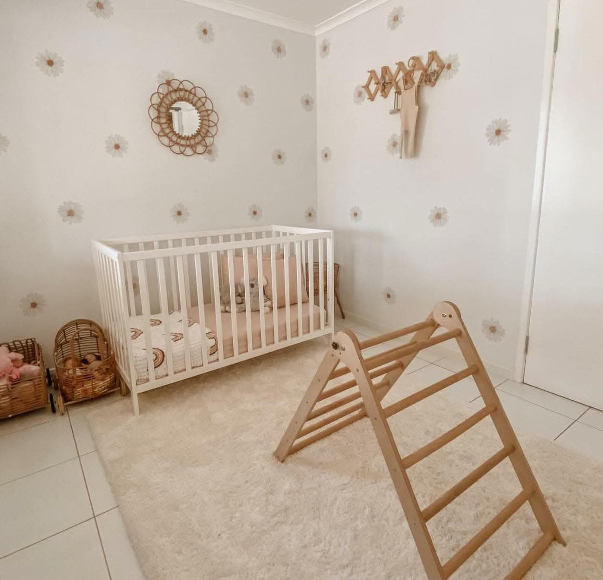 Customer photo of mini daisy decals in a nursery with a climbing frame